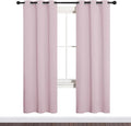 NICETOWN Blackout Curtain Panels for Girls Room, Nursery Essential Thermal Insulated Solid Grommet Top Blackout Drapes (Lavender Pink, 1 Pair, 34 x 72 inches)