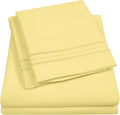 Sweet Home Collection California King Size Sheet Set with Built-in Sheet Straps - Deep Pocket Fitted Sheet, Flat Sheet & Pillowcases - Soft, Wrinkle-Free, Secure Fit - Pale Yellow